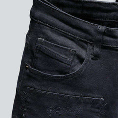 Black distressed jeans for men