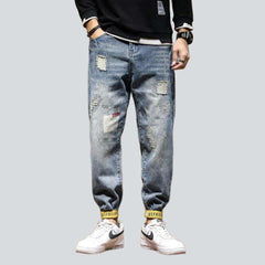 Inscribed yellow hem men jeans