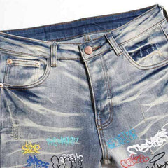 Graffiti print ripped men jeans