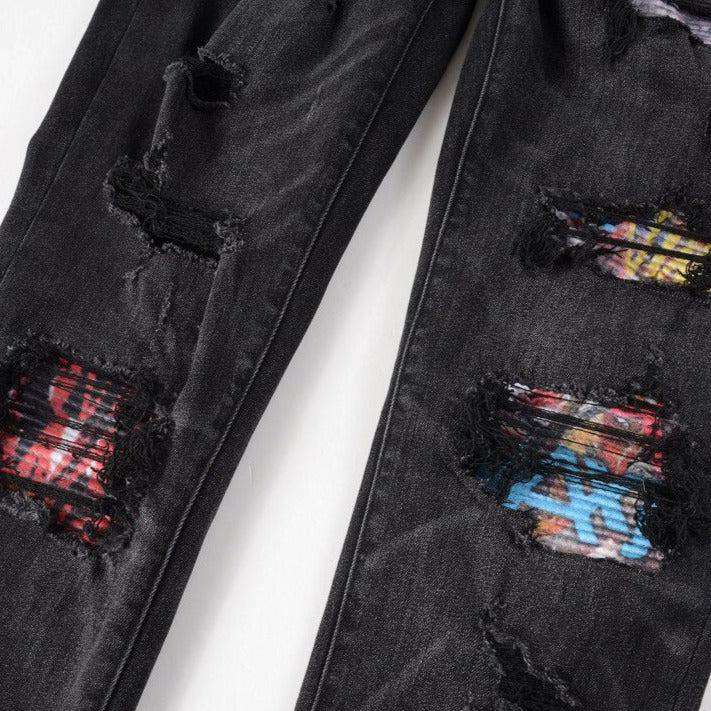 Graffiti print patchwork biker jeans