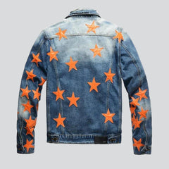 Vintage Jeansjacke mit orangenen Sternen