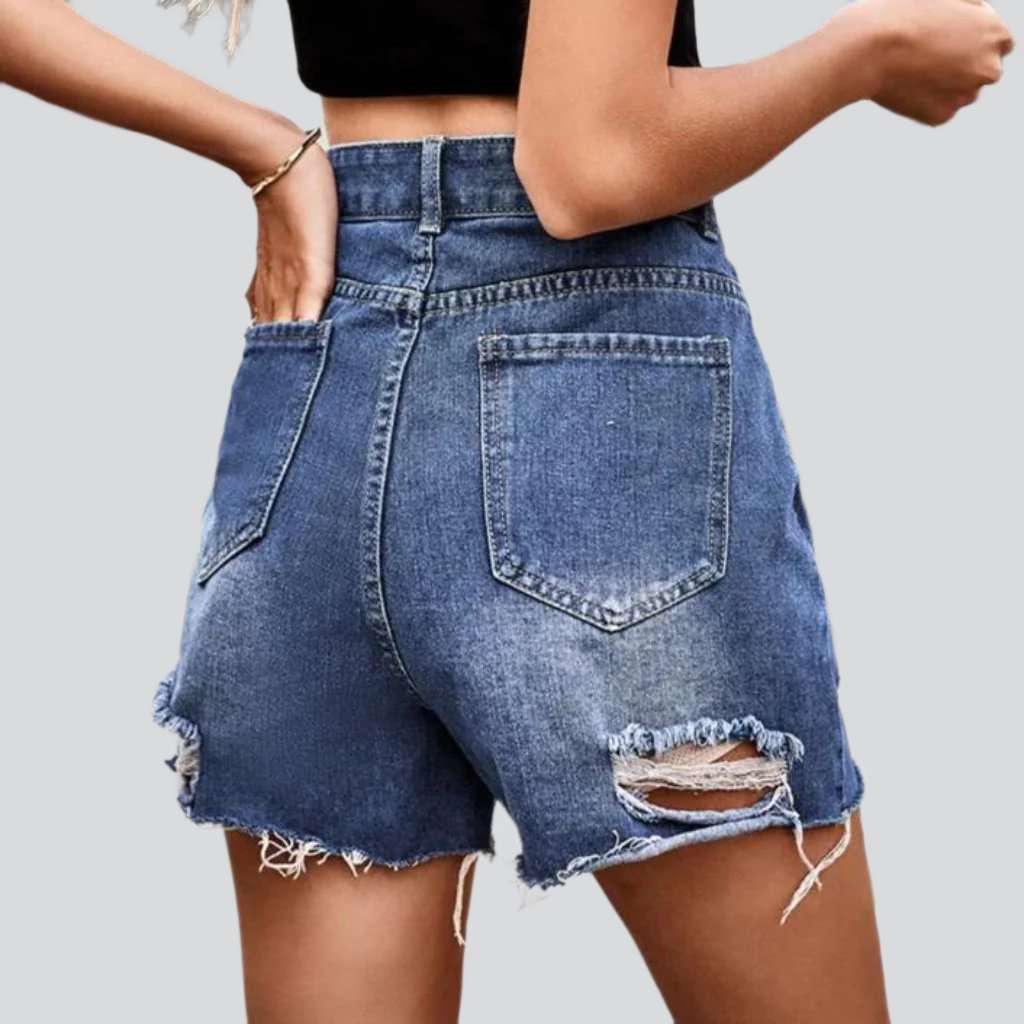 Medium wash distressed denim shorts