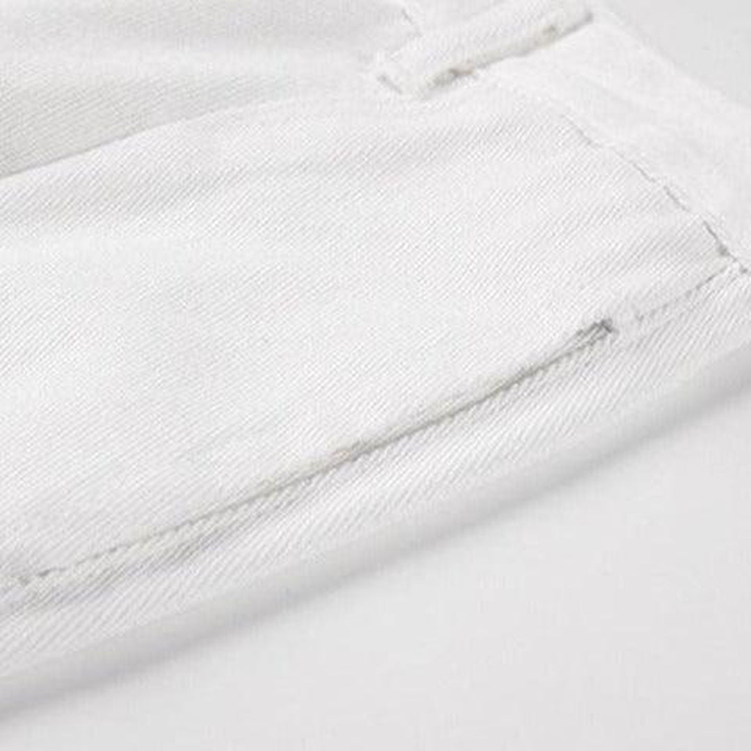 Distressed white women baggy jeans