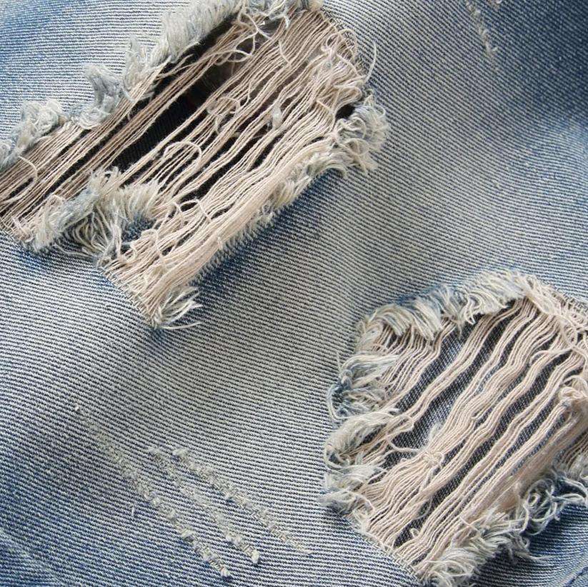 Hem embroidery ripped denim shorts