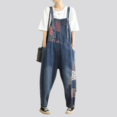 Medium wash women jean jumpsuit