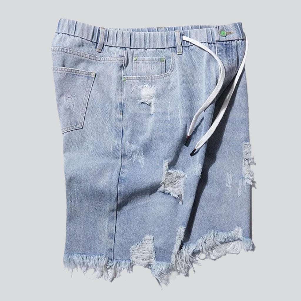 Distressed denim shorts with drawstrings