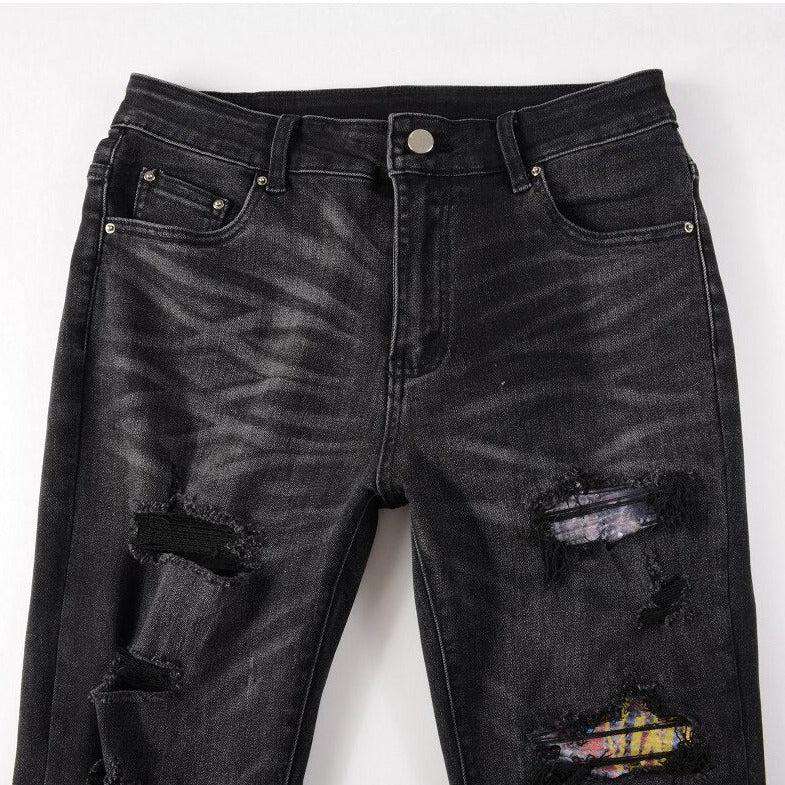 Patchwork-Bikerjeans mit Graffiti-Print