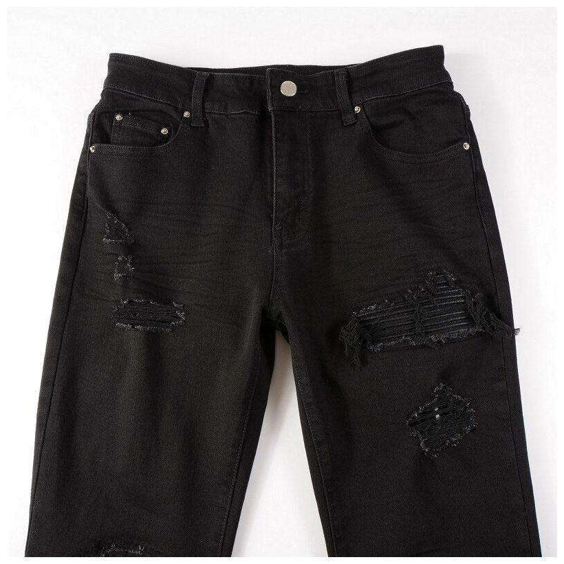 Schwarze Bikerjeans mit Lederpatch