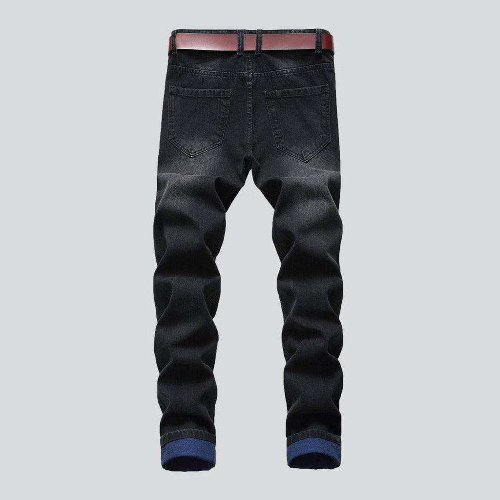 Farbig zerrissene Herrenjeans