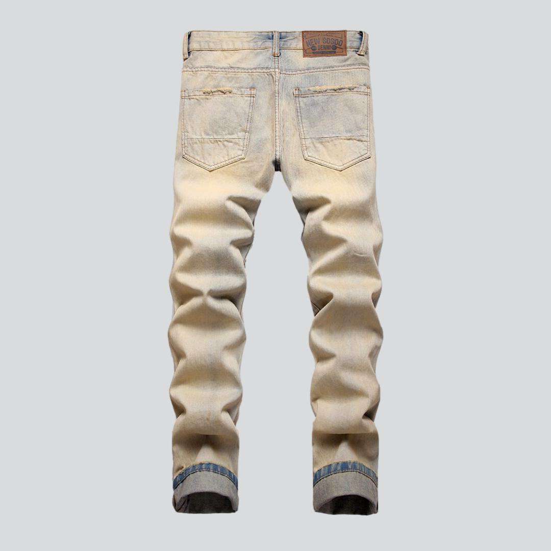 Distressed men jeans with zippers