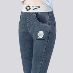 Embroidered vintage jeans