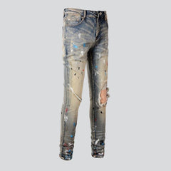 Vintage jeans with paint splatters