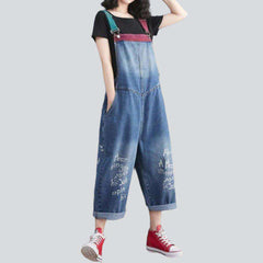 Denim jumpsuit with color suspenders