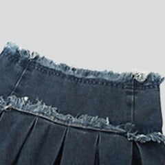 Distressed waistband mini denim skirt