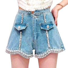 Shorts vaqueros con costuras adornadas con diamantes