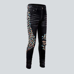 Multicolor stains painted men jeans