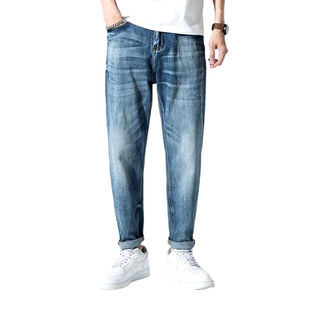 Stonewashed men whiskered jeans