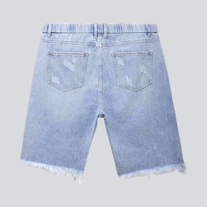 Shorts vaqueros desgastados con cordones