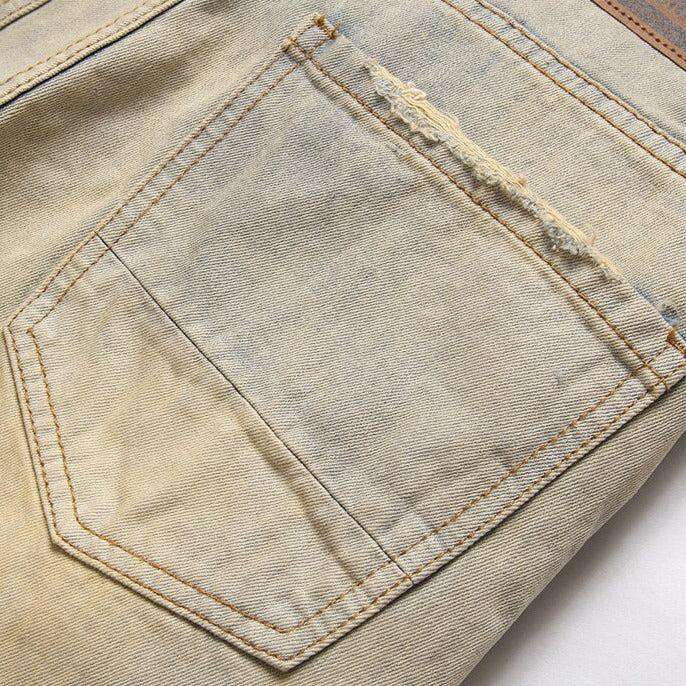 Distressed men jeans with zippers