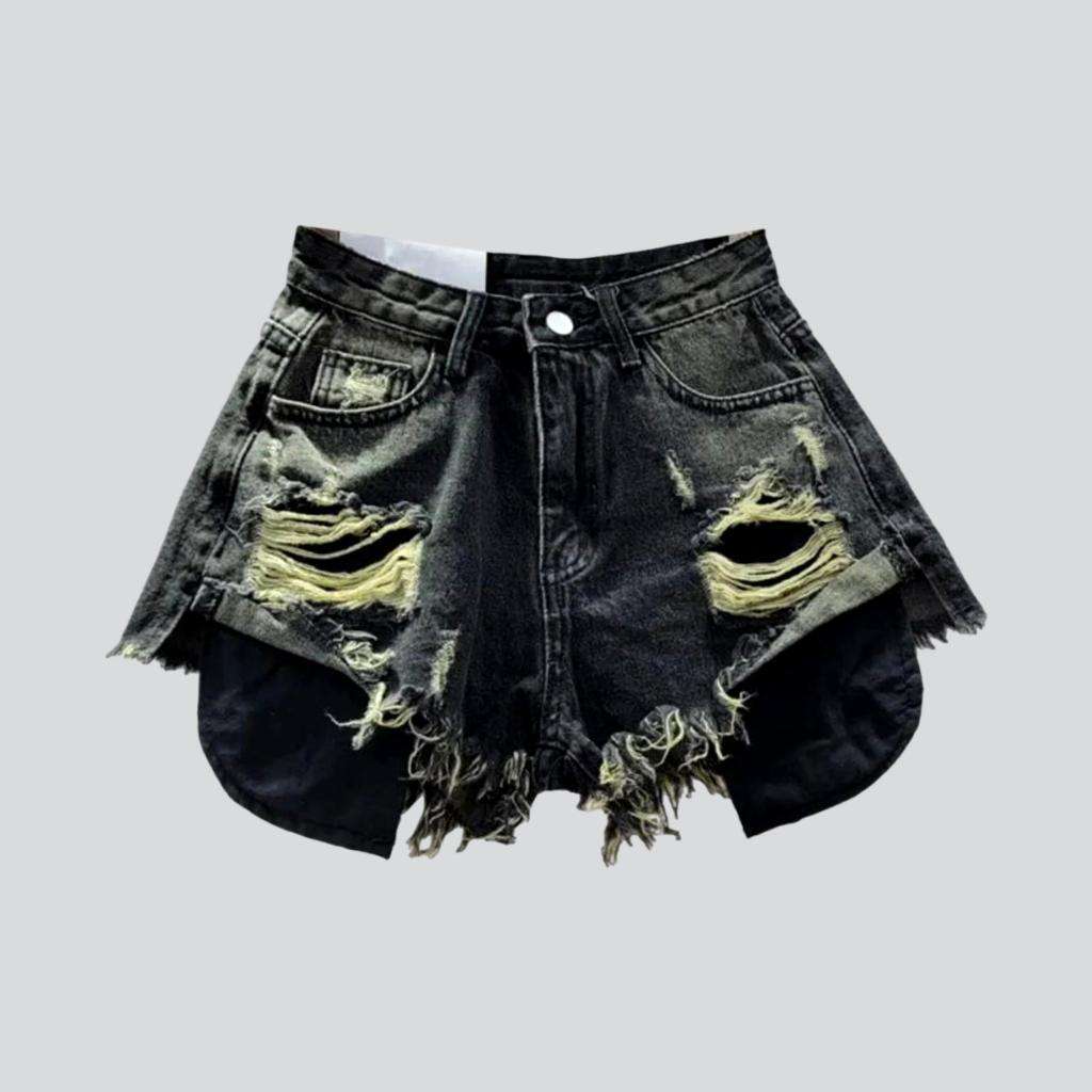 Shorts vaqueros desgastados con bolsillos expuestos