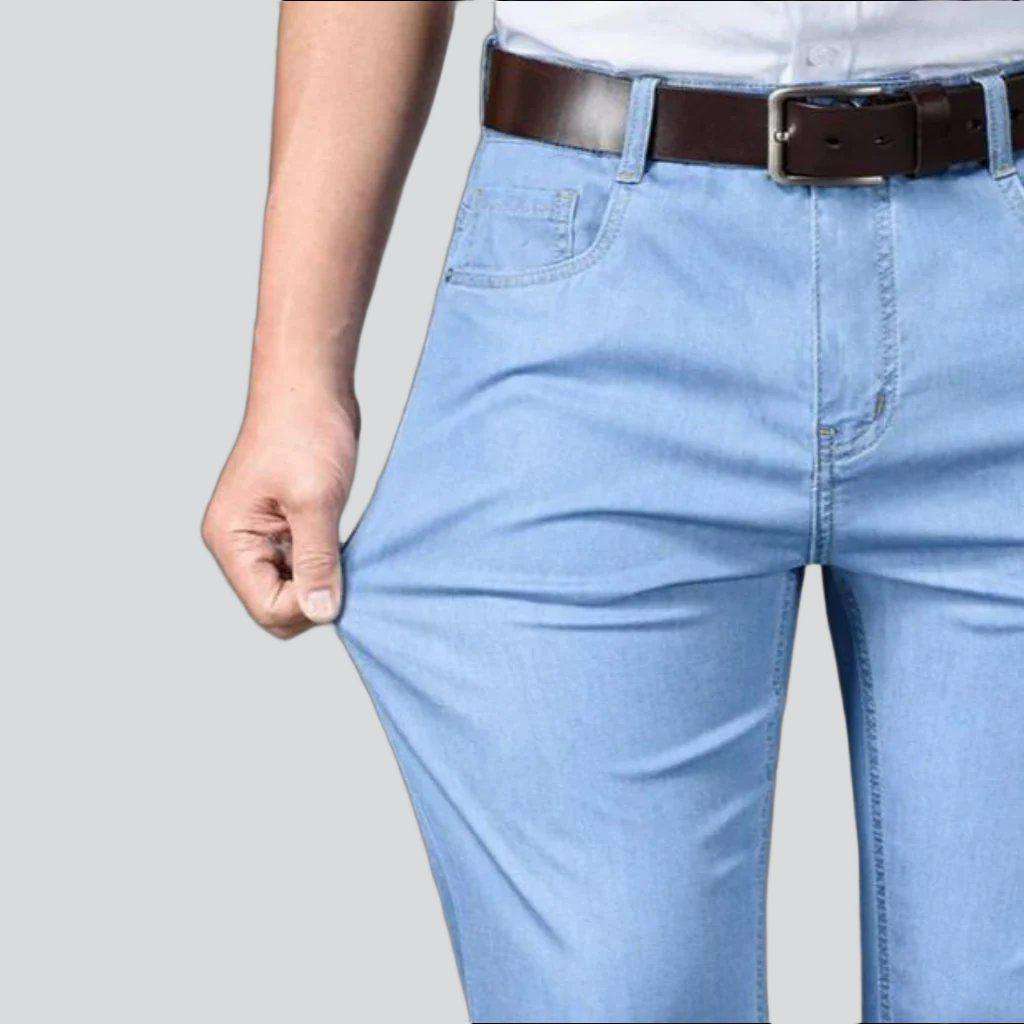 Vaqueros elásticos azules monocromáticos para hombre