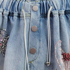 Rhinestone flower embellished denim shorts