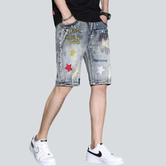 Micro-stamped ripped denim shorts