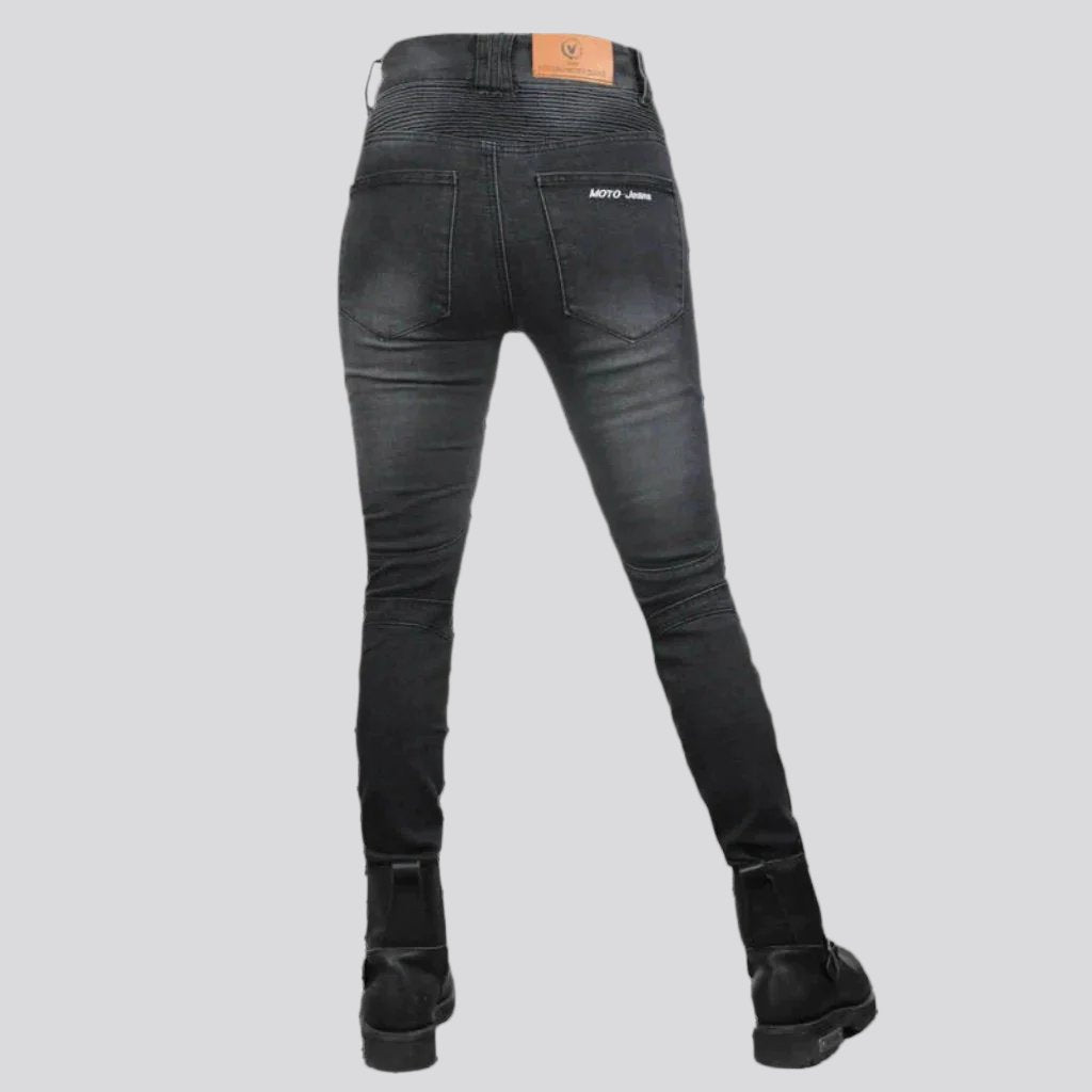 Sanded women riding jeans