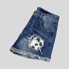 Palm patches distressed denim shorts