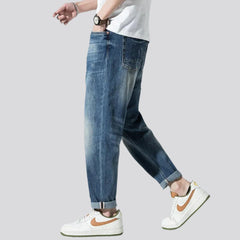 Men medium-wash jeans