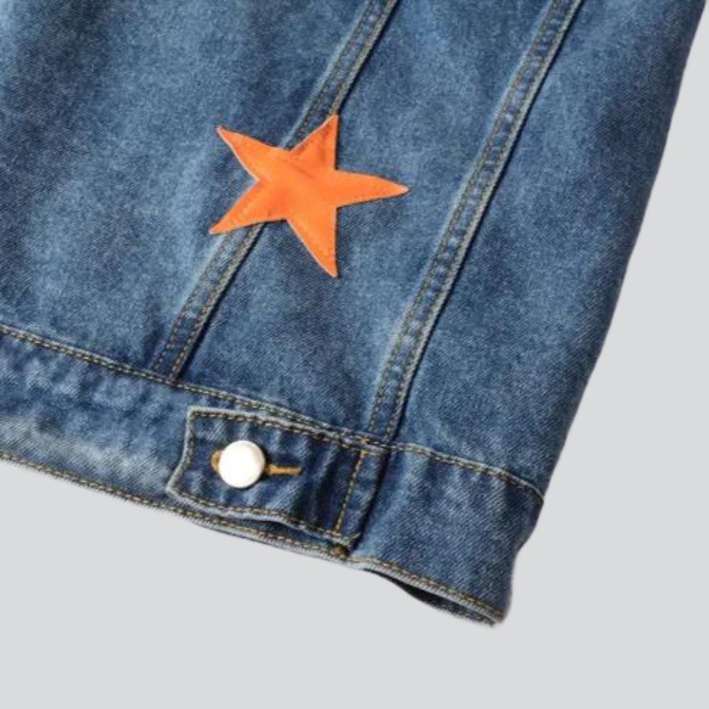 Chaqueta vaquera vintage con estrellas naranjas