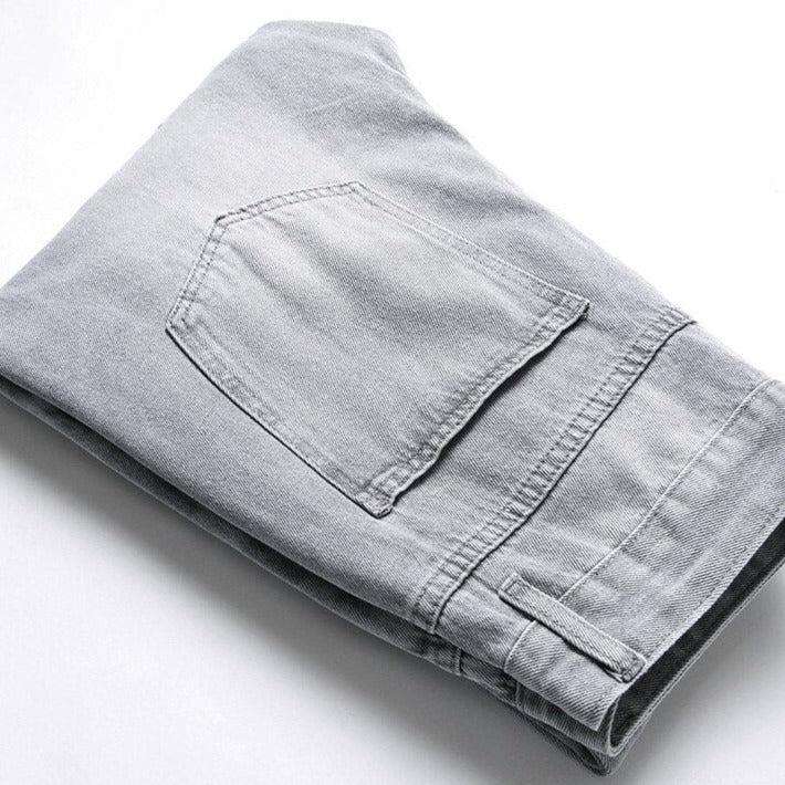 Grey jeans with buttoned pockets