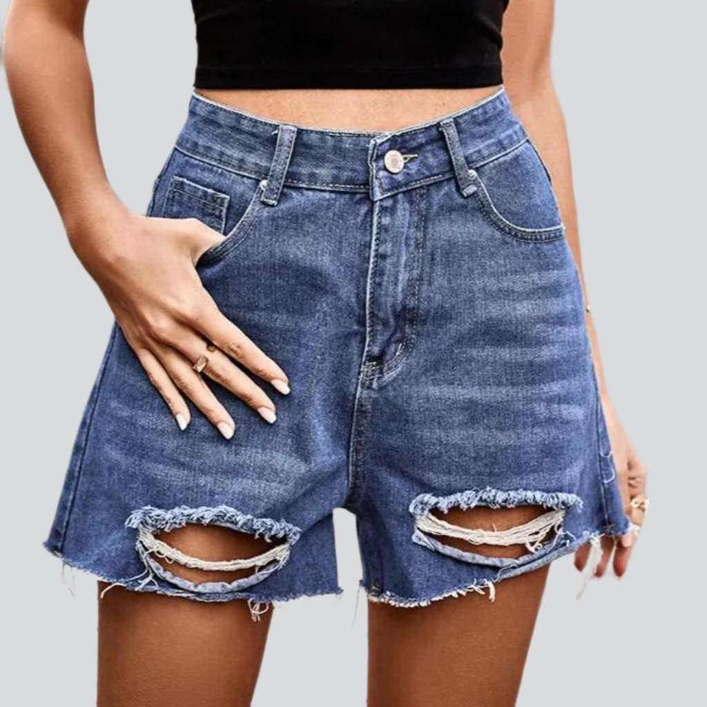 Medium wash distressed denim shorts