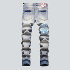 Graffiti-painted men jeans