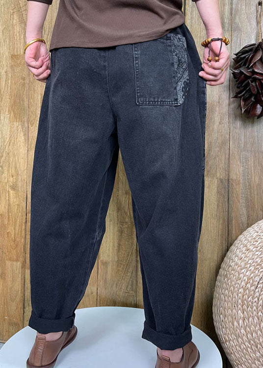 Style Schwarze Jeanshose mit Knopfaufnäher-Applikation