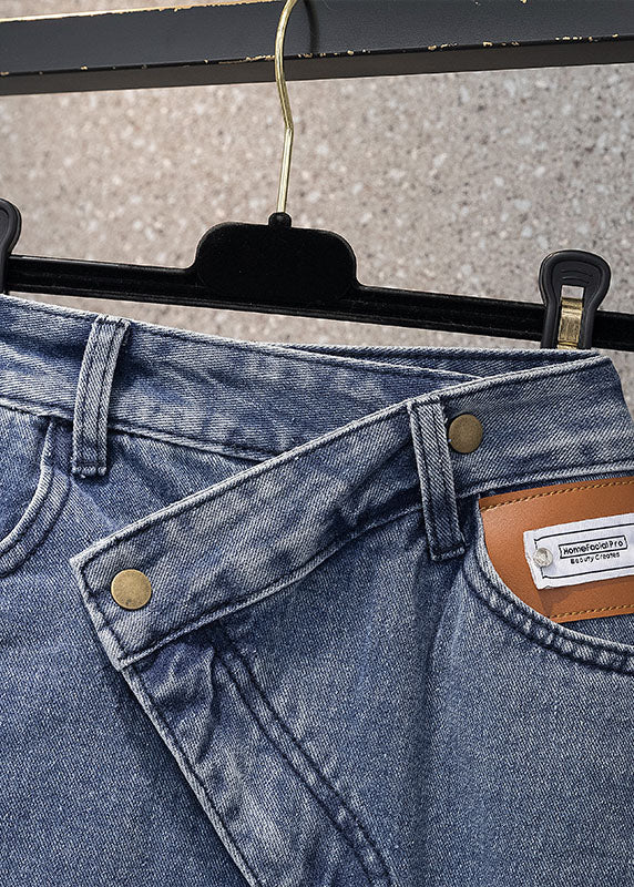 Stil Denim Hellblau Hohe Taille Seitlich Offener Knopf Asymmetrische Taschen Baumwolle A-Linie Röcke