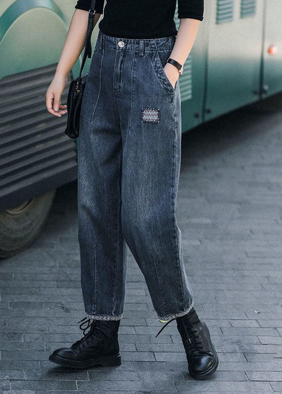 Pantalones vaqueros estilo harén de cintura alta con bolsillos y estampado floral azul marino para otoño.