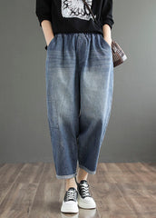 Pantalones harén de algodón con cintura elástica, bolsillos y apliques de patchwork en color azul vaquero liso