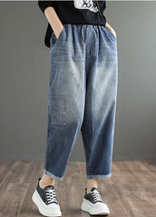 Pantalones harén de algodón con cintura elástica, bolsillos y apliques de patchwork en color azul vaquero liso