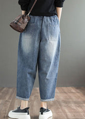 Pantalones harén de algodón con cintura elástica, bolsillos y apliques de patchwork en color azul vaquero liso