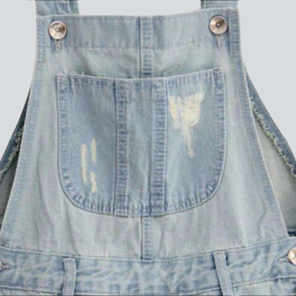 Light wash ripped denim romper