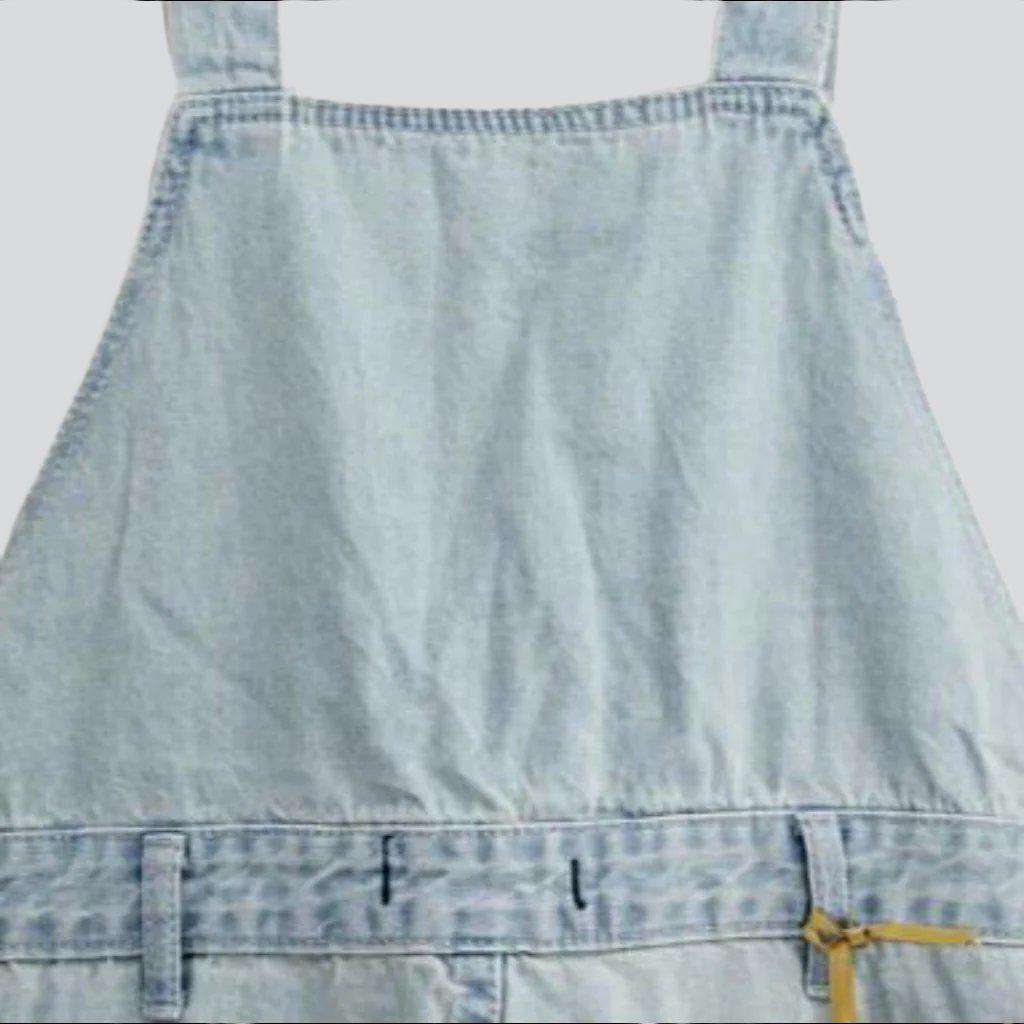 Light wash ripped denim romper