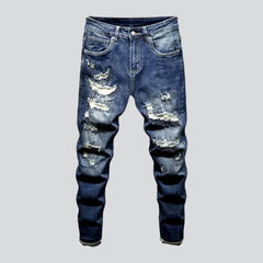 Trendy style distressed blue jeans