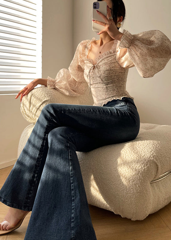Pantalones acampanados de mezclilla azul vintage con bolsillos de cintura alta y cremallera para otoño