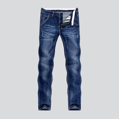 Whiskered medium wash men jeans