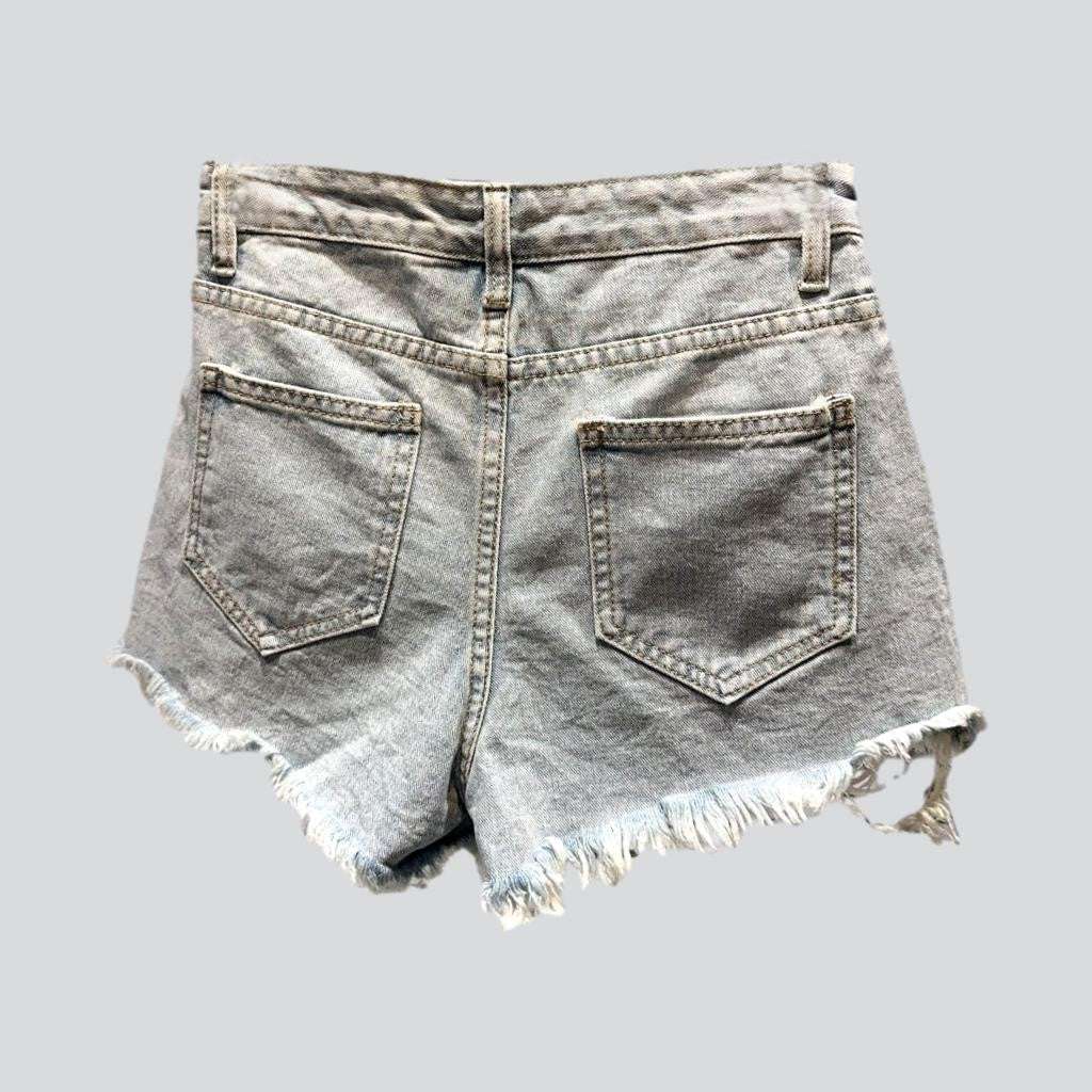 Fringe pocket distressed denim shorts