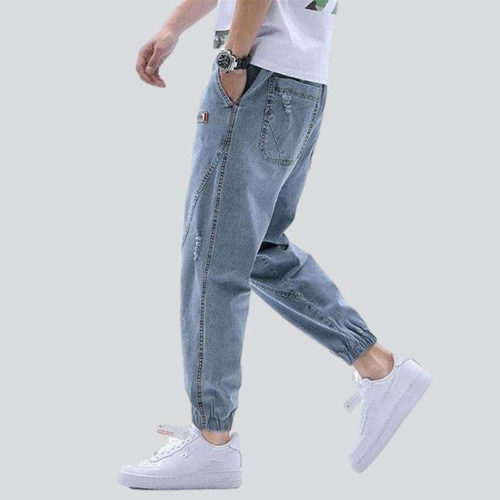 Loose men jeans with straps