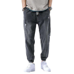Loose men jeans with straps