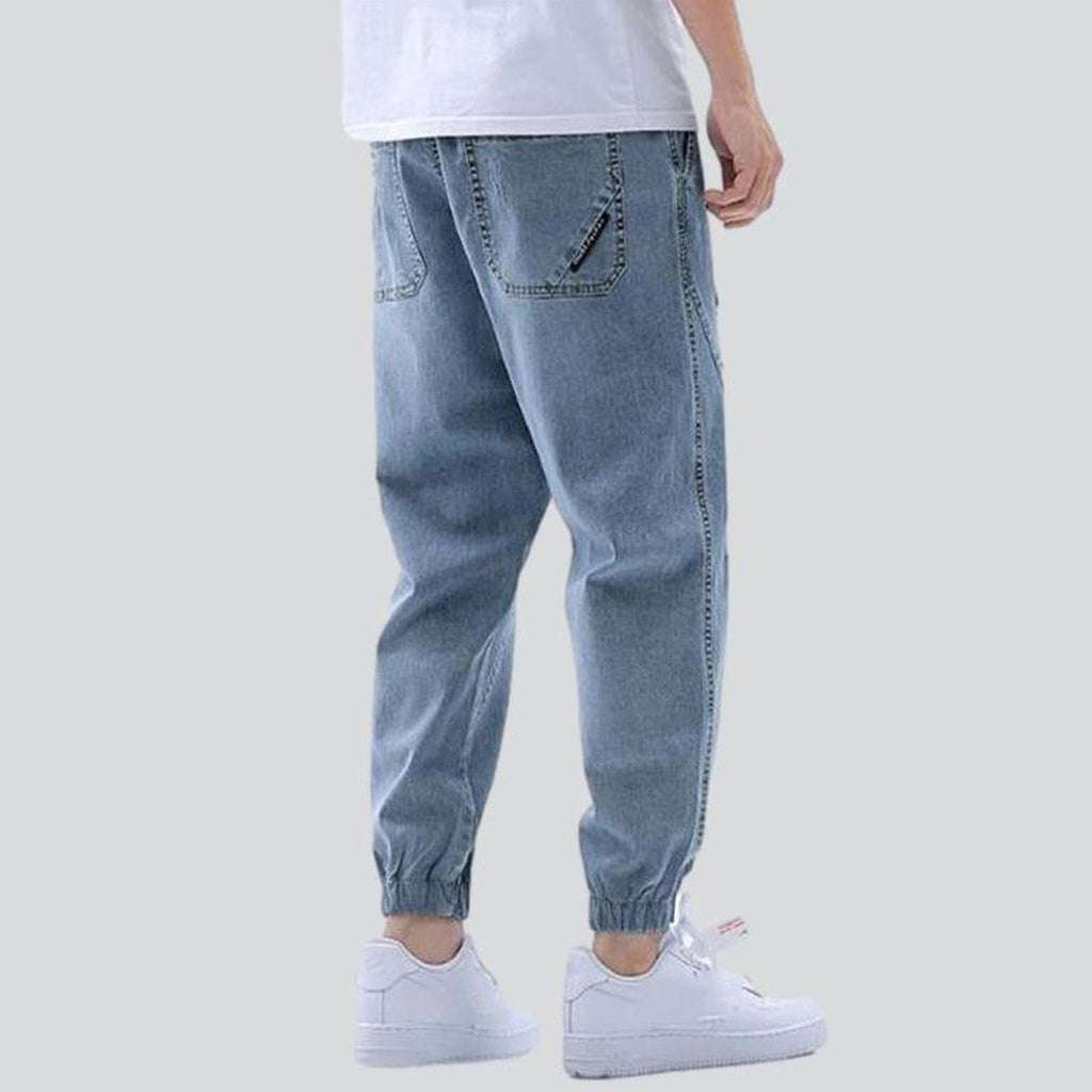 Loose men jeans with straps