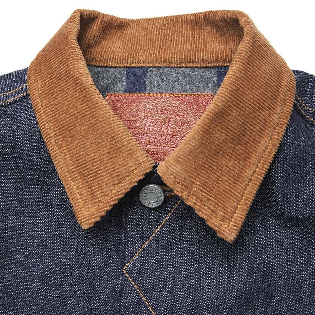 Denim jacket with a brown collar